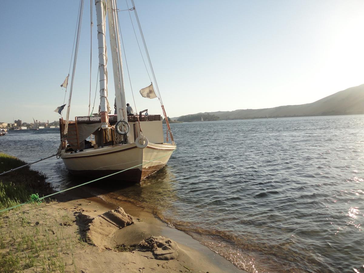 Younes Rejser Oriental Dream felucca Aswan sun docking at island